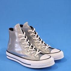 Converse Chuck 70 Hi Industrial Glam Shiny Silver Gray Women's Sneakers 568796c Nwt Sizes: Women's 5.5 Women's 6 Mpn: 568796c More Cushioning, Tougher Canvas, Same Versatility. The Chuck 70 High Top Is Built Off Of The Original 1970s Design, With Premium Materials And An Extraordinary Attention To Detail, With Added An Extra Cushy Insole For Arch Support And Stability. Canvas Upper Is Lightweight And Durable. The Timeless Silhouette You Know And Love. Rubber Outsole For Added Traction. Ortholite Silver Lace-up Sneakers With Metallic Logo, Metallic High-top Sneakers For Streetwear, Silver Sneakers With Metallic Logo For Streetwear, Modern Silver Sneakers With Laces, Silver Casual Sneakers With Metallic Logo, Modern Metallic Silver Sneakers With Round Toe, Modern Metallic Silver Round Toe Sneakers, Metallic Silver High-top Sneakers For Streetwear, Silver Lace-up High-top Sneakers