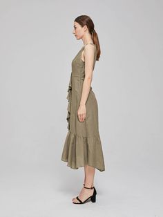 Made from a lightweight breezy linen blend fabric, the Willow Frill Midi Dress features fitted bodice, a round neckline, frilled hem at bottom, asymmetric cascading ruffles that effortlessly drape over the silhouette and is finished with zip fastening at the side seam. Fit: designed for a comfortable fit on the bust and waist, bra friendly. Fabric offers no stretch. Fabric: 55% linen, 45% cotton Designed in Australia, made in China Care Instructions: Delicate 30 Degree machine wash Model is 178 Knee-length Asymmetrical Ruffle Dress For Summer, Asymmetrical Midi Dress With Ruffle Hem For Spring, Sleeveless Linen Dress With Ruffle Hem, Chic Linen Midi Dress With Ruffles, Casual Midi Dress With Asymmetrical Ruffle Hem, Spring Knee-length Linen Dress With Ruffles, Spring Midi Dress With Ruffles And Asymmetrical Hem, Knee-length Ruffled Linen Dress For Spring, Chic Midi Linen Dress With Ruffles