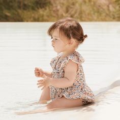 Our Sleeveless Ruffle Bottom Dress in the Meadow Breeze print is the perfect addition to your little one's spring and summer wardrobe. This lightweight and breathable dress is made from 100% cotton for ultimate comfort and features a sleeveless design with a charming ruffled hemline. The Meadow Breeze print features small florals in shades of rust, brown, and cream on a soft beige background. This dress is perfect for any summer occasion, from playdates in the park to family gatherings. Pair it Ruffle Bottom Dress, Cozy Sleepwear, Annual Sale, Baby Co, Future Mom, Soft Beige, Bubble Romper, Beige Background, Bamboo Fabric