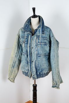 "To die for 80s/90s style bomber jacket in an acid wash with double collar, great pocket on the side, unique detailing and intact strings in the collar. This thing has it all.  In good vintage condition with some yellowing to the fabric. See photos for details.  Measured Flat: P2P 24\" W Waist 20.25\" W  S2S 23.5\" W Length from Shoulder to end of sleeve 24\" L Collar to bottom 25.5\" L See photos for more details All sales final Domestic US shipping included" Vintage Washed Outerwear For Streetwear, Vintage Acid Wash Outerwear For Fall, Distressed Vintage Denim Jacket For Streetwear, Vintage Distressed Faded Outerwear, Acid Wash Retro Outerwear For Spring, Retro Acid Wash Outerwear For Spring, Vintage Stonewashed Cotton Outerwear, Vintage Acid Wash Denim Jacket For Streetwear, 90s Distressed Outerwear For Streetwear