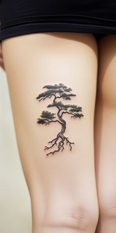 A minimalist, aesthetic bonsai tattoo graces the thigh, embodying the wearer's respect for nature. Check out our 'TreeTee' Etsy shop, where each tee bought supports our tree-planting mission, fostering a more sustainable world together. Future Tattoo Ideas, Tattoo On The Thigh, Tattoos For Baby Boy, Hippie Tattoo, Arm Tats, Finger Tats, Cool Tattoo