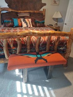 a bed with a wooden headboard and foot board