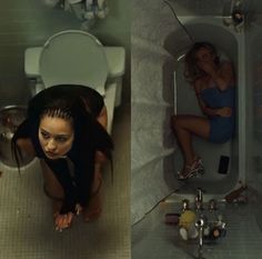 two women sitting in a bathtub with their backs turned to the side, and one standing up