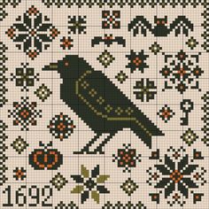 a cross stitch pattern with a black bird on it