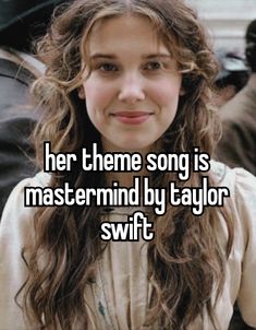 a girl with long hair and the words her theme song is mastermid by taylor swift