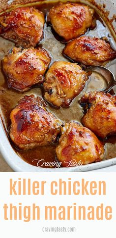 chicken thighs with marinade in a white casserole dish