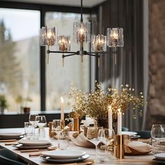 a dining room table is set with candles and place settings