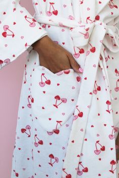 Designer Notes Introducing our stunning Chérie Robe crafted from 100% organic cotton for ultimate comfort and style. With its eye-catching cherry print and heart-shaped pockets, this robe is the perfect addition to your loungewear collection Made with high-quality, 100% organic cotton, ensuring a soft and breathable feel against your skin. The robe is designed with a roomy, relaxed fit and a waist tie for an adjustable and comfortable fit. The cherry heart print adds a fun and playful touch to t Fun Things To Buy, Cute Robes, Pijamas Women, Terry Robe, Heart Prints, Cute Pjs, Cute Pajama Sets, Heart Pocket, Cute Pajamas