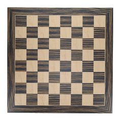 a black and white checkerboard pattern on wood