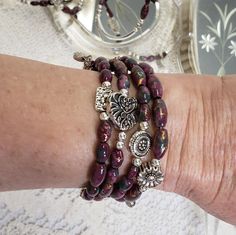 Gorgeous Magnetic Wrap Bracelet with Burgandy Hematite Magnetic Beads have a Heart and 3 other Charms. While the magnetic beads will not heal your arthritis, carpal tunnel, neuropathy, etc..., they may help ease the pain while you are wearing them. They will be the perfect gift for her for Christmas, Birthday, Mother's Day, or yourself. These unique magnetic bracelets are handmade and beaded on stainless steel memory wire that will adjust in size to ensure these wrap bracelets will fit most any Wrap Bra, Magnetic Bracelets, Magnetic Beads, Beads Christmas, Silvery Blue, Valentines Birthday, Magnetic Jewelry, Carpal Tunnel, Wrap Bracelets