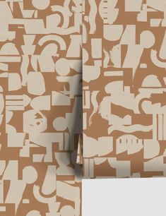 the wallpaper is made up of letters and numbers in shades of brown, beige and white