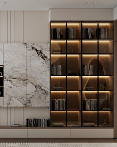 a modern living room with marble walls and shelves in the center, along with bookshelves