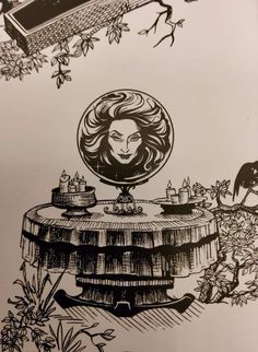 a drawing of a woman's head sitting on top of a table surrounded by flowers