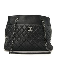 This is an authentic CHANEL Caviar Quilted Urban Companion Shopping Tote in Black. This handbag is made with a sturdy shape crafted of luxurious diamond quilted black caviar leather. The bag features aged ruthenium leather threaded chain shoulder straps and a large front pocket with a CC logo. The top is open to a partitioned black interior with a center zipper compartment and patch pockets. Designer Formal Bags With Diamond Quilting, High-end Quilted Shoulder Bag For Formal Occasions, Designer Diamond Quilted Formal Bags, Classic Black Bag With Diamond Quilting, High-end Quilted Bags For Formal Occasions, High-end Quilted Formal Bag, High-end Formal Quilted Bags, Luxury Black Shoulder Bag With Diamond Quilting, Black Diamond Quilted Bag For Everyday Luxury