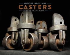 four old cast iron casteors with the words antique industrial casteors by iron anarchy