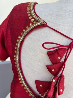 Boat Neck Style Maroon Color Raw Silk Blouse with beautiful Handwork Work done with beads. Item : Readymade BlouseColor : Maroon ColorBlouse Fabric : Raw Silk Lining : Yes, it is fully lined Padded or Non-Padded : PaddedClosure: Back Closure with hooks.Ready-to-Wear : YesDisclaimer - : -This is a Standard Size blouse. We do not guarantee perfect fit as every body and shape is different. Little or no alteration would be required to get the perfect fit. - Color variation is possible due to various Embellished Blouse With Traditional Drape For Diwali, Embellished Traditional Drape Blouse For Diwali, Diwali Embellished Traditional Drape Blouse, Bollywood Style Embellished Blouse With Traditional Drape, Embellished Blouse For Designer Wear, Bollywood Style Embellished Traditional Drape Blouse, Anarkali Style Embellished Semi-stitched Blouse, Embellished Semi-stitched Blouse For Festive Season, Anarkali Embellished Blouse