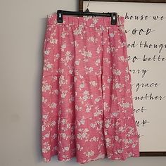 New Floral Print Skirt 60% Cotton 40% Polyester Has Pockets Pink Relaxed Skirt Bottoms For Day Out, Long Pink Skirt With Elastic Waistband, Casual Pink Maxi Skirt For Vacation, Pink Knee-length Bottoms For Spring, Casual Pink Maxi Skirt With Elastic Waistband, Pink Skirt With Elastic Waistband For Day Out, Pink Tiered Skirt For Day Out, Pink Relaxed Skirt For Vacation, Pink Maxi Skirt For Day Out