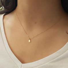 Gold Hamsa Necklace,Dainty Gold Necklace, Luck Necklace, Small Charm Necklace, Hamsa necklace, Evil eye necklace, Tiny Hamsa NecklaceVery very tiny hamsa charm necklace.Classic everyday minimalist jewelry.Sterling silver or gold filled chain with the beautiful and delicate tiny hamsa pendant .The hamsa necklace as a symbol of luck-you must have one :)!  This necklace is perfect for yourself, giving as a special gift, or bridesmaid necklace.PLEASE NOTICE: Hamsa Pendant size VERY TINY !!  - 5mm * Hamsa Necklace Gold, Luck Necklace, Hamsa Jewelry, Backdrops Necklace, Necklace Evil Eye, Blue Opal Necklace, Hamsa Charm, Gold Hamsa, Hamsa Pendant