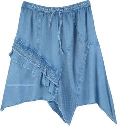 A western look medieval style skirt in an all year around popular color.  This unique slightly stonewashed masterpiece skirt with a handkerchief bottom is made of 100% rayon. #tlb #JuniorPetite #Misses #HighLow Bohemian Summer Denim Skirt With Frayed Hem, Bohemian Denim Blue Skirt, Summer Bohemian Denim Skirt With Frayed Hem, Bohemian Cotton Skirt With Frayed Hem, Bohemian Style Medium Wash Cotton Skirt, Bohemian Medium Wash Cotton Skirt, Bohemian Denim Skirt In Medium Wash, Bohemian Medium Wash Denim Skirt, Bohemian Cotton Bottoms With Asymmetrical Hem