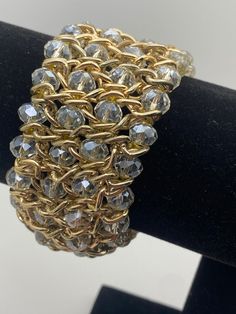 So much holiday sparkle!  Stretch bracelet, clear beads in goldtone setting.  6.25 inches, 1.50 inches wide.  Great condition. Clear Beads, Holiday Sparkle, Stretch Bracelet, Stretch Bracelets, Jewelry Bracelets, Gold Tones, Beaded Bracelets, Sparkle, Bracelet