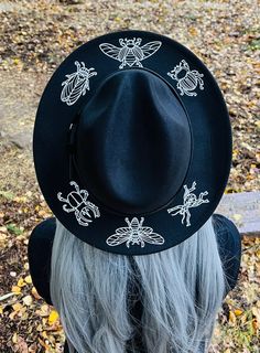 "Welcome to Witchwood's brand new hat line! These wide brim hats are made of sturdy vegan felt and are all hand printed.     Vegan Felt Size: 22.5\" (but size is adjustable and can be sized down, inside the hat) Brim - 2.5\" wide Hat Color - Black Print Color - White    Hats will ship in 7-10 business days from date of order" Adjustable Short Brim Fedora For Halloween, Adjustable Short-brim Fedora For Halloween, Adjustable Fedora Felt Hat For Halloween, Witchy Hat With Curved Brim For Winter, Witchy Winter Hat With Curved Brim, Witchy Curved Brim Winter Hat, Flat Brim Halloween Hat, Witchy Wide Brim Hat For Fall, Fitted Flat Brim Hat For Halloween