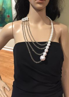 "This unusual, interesting, elegant, feminine, and classy pearl necklace has been designed and made by Mirela Skikic - USA. This complex necklace is made of white glass pearls on silver metal wire that can be adjusted to the position on your chest as you like. It closes with a silver color lobster clasp. It looks very elegant with any type of formal and casual outfit. It also can be a nice wedding accessory. It can be combined with other pieces from my \"Pearl Madness\" collection, which also ca Long Pearl Necklace With Pearl Chain For Party, Long Pearl Necklace For Party, Long Pearl Chain Necklace For Party, Long Pearl White Pearl Necklace For Party, White Pearl Drop Chain Necklace For Party, White Pearl Chain Necklace For Evening, White Pearl Backdrop Necklace, Elegant Handmade Pearl Chain Necklace, Handmade Elegant Pearl Chain Necklace