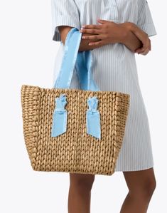 Pamela Munson's Isla Bahia tote bag is an endlessly versatile accessory you'll be carrying all season. Woven from corn husks and finished with sweet grosgrain handles, this lined carryall is just as perfect for the beach as it is for lunch with the ladies. Style it with all of your favorite casual warm weather ensembles. Corn Husks, Blue Weave, Ladies Style, Woven Tote Bag, Warm Weather, Corn, The Beach, Handles, Tote Bag