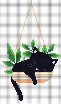 a cross stitch pattern with a black cat sleeping in a bowl on top of bamboo leaves