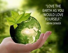 a person's hand holding a green globe with a quote from john denver about love the earth as you would love yourself