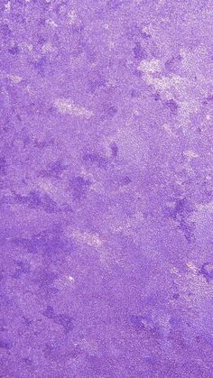 an abstract purple background with white spots