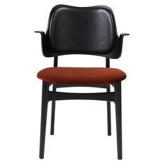 a black chair with an orange cushion on the back and armrests, against a white background