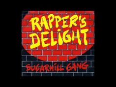 a brick wall with graffiti on it and the words rapper's delight written in yellow