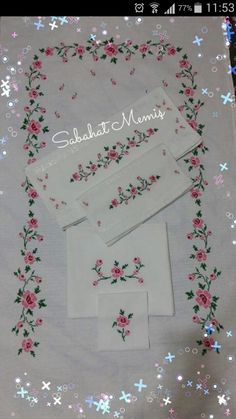 three sheets with pink flowers and stars on them