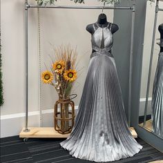 Steal The Show Is This Gorgeous Gown! Gown Features A Choker Style Neck With Sexy Black Illusions Panels At The Sides. Zipper Back And Has Pockets! Size : 4 Color: Grey Metallic Measurements: Bust 34in Waist 26in Hip 37.5in Choker Style, Armor Dress, Formal Gown, Choker Dress, Gorgeous Gowns, Boutique Couture, Formal Gowns, Prom Colors, Red Queen