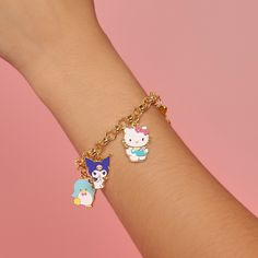 Celebrate the magic of friendship with the Sanrio Hello Kitty and Friends Charm Bracelet. This playful bracelet features an array of adorable charms, each representing Hello Kitty and her beloved friends. With its vibrant colors and delightful designs, this charm bracelet is the perfect accessory for any Sanrio fan. Friendship Novelty Charm Bracelet, Cute Blue Charm Bracelet For Friendship, Cute Adjustable Charm Bracelet, Cute Charm Bracelet With Removable Charms As Gift, Cute Multicolor Jewelry With Removable Charms, Cute Jewelry With Removable Charms For Friendship, Playful Friendship Charm Bracelet, Kawaii Jewelry With Cute Adjustable Design, Cute Blue Charm Bracelet For Gift