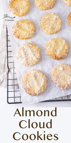 an image of almond cloud cookies on a cooling rack with the words almond cloud cookies above it