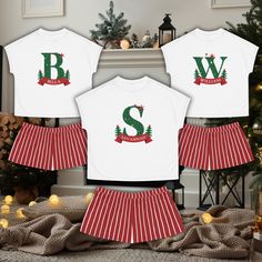 🧸Why choose between comfort and style when you can have both? This Christmas-themed "Your Name" pajama set is the perfect addition to your holiday wardrobe. Designed with a relaxed fit, this women's short two-piece set features a ribbed collar and no sleeve seams, ensuring maximum comfort. Made from 95% polyester and 5% spandex, the fabric offers a cozy feel with just the right amount of stretch. The seam thread color is carefully matched to the design, and the set includes a sewn-in label on t Christmas Pyjama Bottoms Cute, Christmas Pajama Shorts Set, Christmas Name Gifts, Themed Christmas Pajamas, Christmas Pajamas T-shirt, Pyjama Christmas, Cozy Homewear, Cute Pyjama, Christmas Pajama Shorts