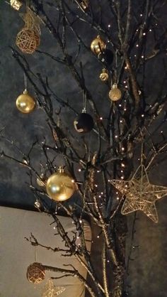 a christmas tree with ornaments hanging from it