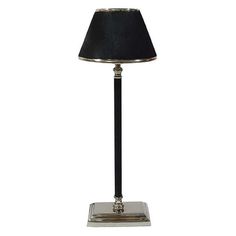 Add an antique twist with this beautiful table lamp. Adorned with a glistening finish, you can dress up your tabletops or nightstand. It defines elegance. Product Features: Constructed of aluminum, this transitional table lamp glistens in nickel finish. Table lamp is topped with a tapered shade and completed with a squared base. Dress up your side table, nightstand or office with this table lamp. Recommended for indoor use only. Dimensions: 23"H x 7.5"W x 7.5"D. Material(s): aluminum/leather/clo Buffet Table Lamps, Beautiful Table Lamp, Transitional Table Lamps, Lamp Store, A&b Home, Fixture Table, Table Nightstand, Buffet Lamps, Black Lamps