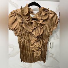 Brand New Structured Top With Tag. Top Has A Sheen Finish. Satin Material Elegant Brown Short Sleeve Blouse, Gold Ruffled Blouse For Spring, Chic Gold Blouse With Ruffles, Fitted Gold Blouse With Ruffles, Elegant Brown Blouse With Ruffles, Textured Tank Top, Structured Top, Sheer Crop Top, Colorful Blouses