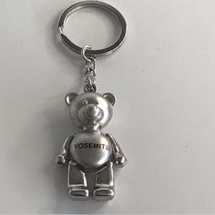 Nwot - Mini 3d Metallic Silver Teddy Bear "Yosemite" Key Chain Color - Silver/Black Metallic Moving Teddy Bear Silver Color Plated Surface Wearable And Will Not Rusted Approximate Measurements: Height: 3.75" (From The Top Of Key Chain) Non Smoking Home Teddy Bear Keychain, Bear Keychain, Black Metallic, Silver Man, Key Chain, Silver Color, Black Silver, Metallic Silver, Teddy Bear