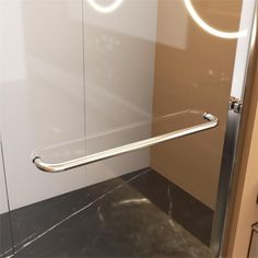 a glass door with a metal handle on it