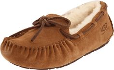 PRICES MAY VARY. By ugg Cushioning foam insole with UGG pure wool lining Boy Uggs Slippers, Toddler Ugg Slippers, Dark Brown Ugg Slippers, Toddler Uggs, Kids Ugg Slippers, Ugg Dakota, Kids Uggs, Kids Luggage, Luxury Store