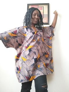 Kitenge African Fabric Mud cloth oversized kimono Handmade dress top made from 100% cotton fabric. On size fits most. Oversized Multicolor Bohemian Blouse, Oversized Bohemian Short Sleeve Blouse, Bohemian Cotton Top With Batwing Sleeves, Bohemian Cotton Tops With Batwing Sleeves, Oversized Bohemian Tunic Blouse, Oversized Cotton Bohemian Blouse, Oversized Short Sleeve Poncho, Bohemian Cotton Top With Kimono Sleeves, Oversized Short Sleeve Kaftan For Festivals