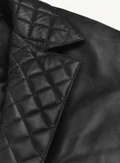 Indulge in elegance and individuality with the Harper Leather Blazer.  Handcrafted from premium leather, its luxurious feel and durability elevate your wardrobe to new heights.  The distinctive quilted lapel adds a modern touch to the timeless classic.  Custom-tailored for a perfect fit. Make a lasting impression. Elegant Quilted Outerwear For Work, Elegant Quilted Outerwear For Office, Quilted Fitted Leather Jacket, Quilted Fitted Leather Jacket For Work, Grey Wool Suit, Blue Linen Shirt, Brown Corduroy Jacket, Cashmere Jacket, Brown Tweed