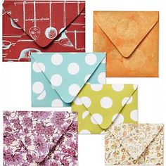 six envelopes with different designs on them