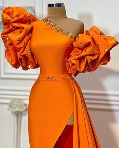 one shoulder unique evening dresses long orange beaded mermaid elegant simple formal evening gown vestidos de fiestaSilhouette: MermaidMaterial: Elastic Silk, Pongee, Satin, rhinestonesHemline: floor LengthNeckline: one shoulderSleeve Length: puffy sleeveBack Details: Zipper UpBody Shape: All Sizes2. This dress could be custom made, there are no extra cost to do custom size and color.If you want s.. Unique Evening Dresses, Orange Evening Dresses, Dress Masquerade, Gown Floral, Beaded Mermaid, One Shoulder Prom Dress, Formal Evening Gown, فستان سهرة, Latest African Fashion Dresses