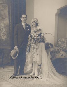 an old black and white photo of a bride and groom