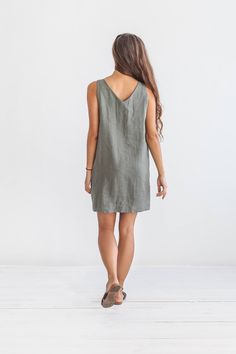 "DESCRIPTION: ♥ 100% natural European linen; ♥ safe Oeko-TEX® Standard 100 certified linen fabric ♥ softened midweight linen (185 g/m2) ♥ sleeveless dress ♥ v neckline FIT ♥ length from the lower to the upper seam is about 33.5 inches / 85 cm ♥ measurements taken from a size S ♥ model is 170 cm and wearing a size S SIZE CHART: XS: Bust 30.7\"- 32.7\" (78-83 cm) , Waist 23.6\"- 25.6\" (60-65 cm), Hips 33.5\"- 35\" (85-89 cm) S: Bust 33\"- 35\" (84-89 cm) , Waist 26\"- 28\" (66-71 cm), Hips 35.5\" Summer Linen V-neck Dress, Casual Linen Mini Dress For Summer, Casual Linen V-neck Mini Dress, Casual Linen Mini Dress, Casual Mini Linen Dress, Casual Relaxed Fit Linen Mini Dress, Casual Linen Mini Dress With Relaxed Fit, Linen V-neck Mini Dress For Vacation, Relaxed Fit Green Mini Dress For Summer