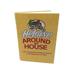 a yellow book with the words house around the house on it